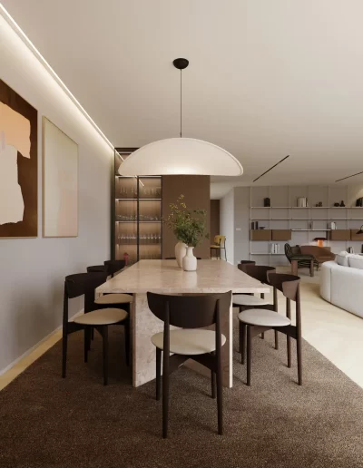 Sala de jantar do projeto The Duneview House, com mesa em mármore travertino, candeeiro em forma de nuvem e tapete escuro.