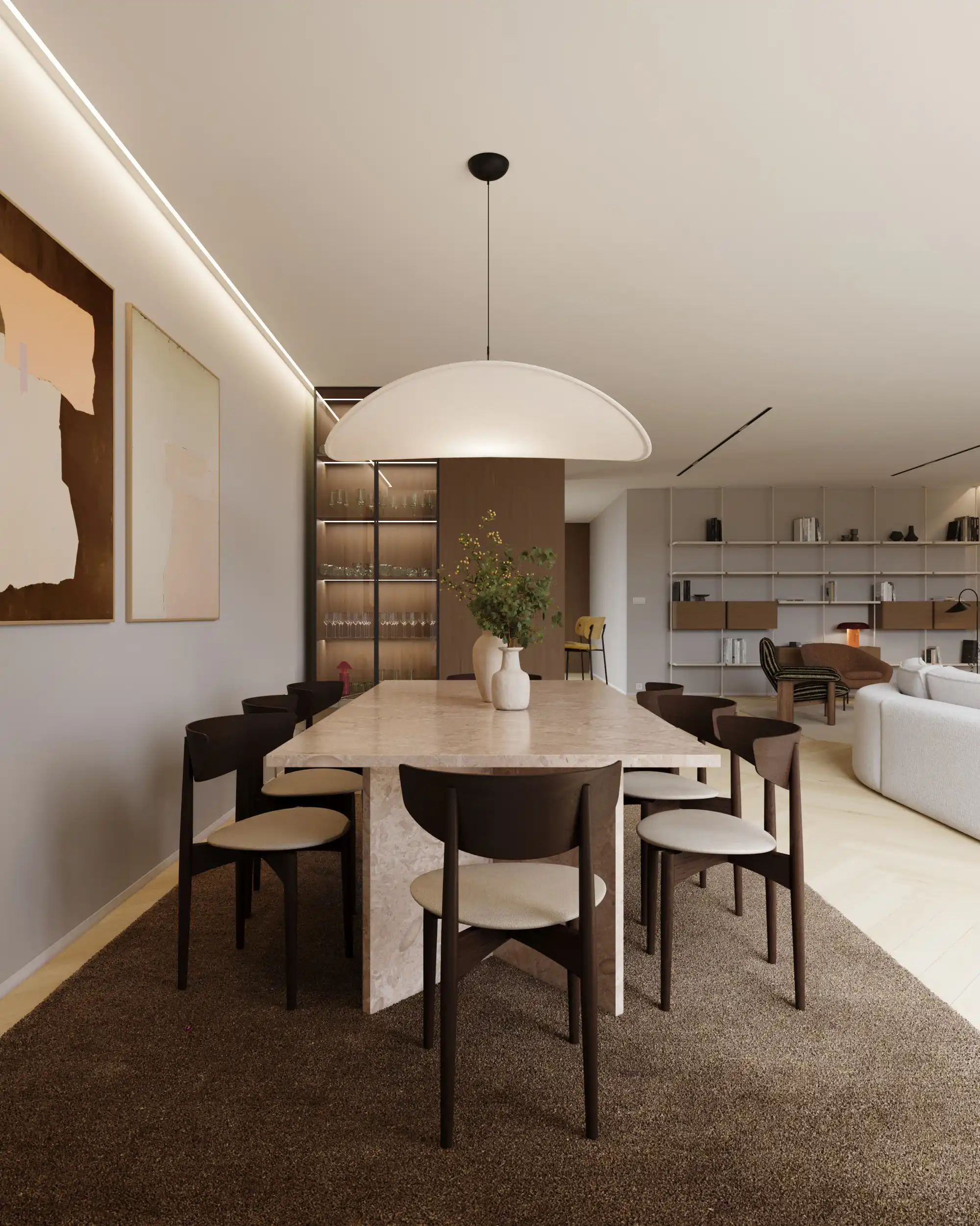 the-duneview-house_sala-de-jantar_casas-com-design Sala de jantar do projeto The Duneview House, com mesa em mármore travertino, candeeiro em forma de nuvem e tapete escuro.